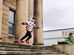 Boy ready to leap off town hall steps