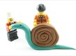 Plasticine snail and lego figures