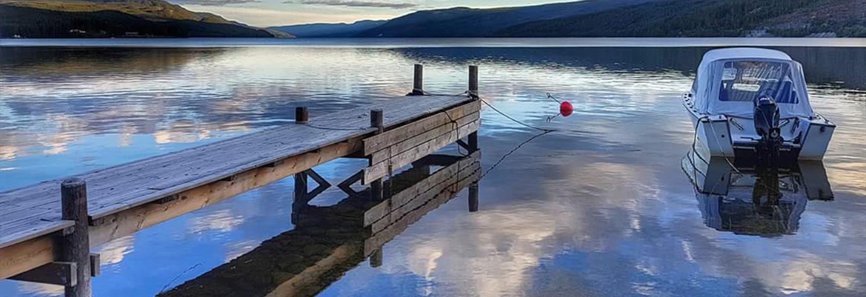 Båt ved vakre Storsjøen