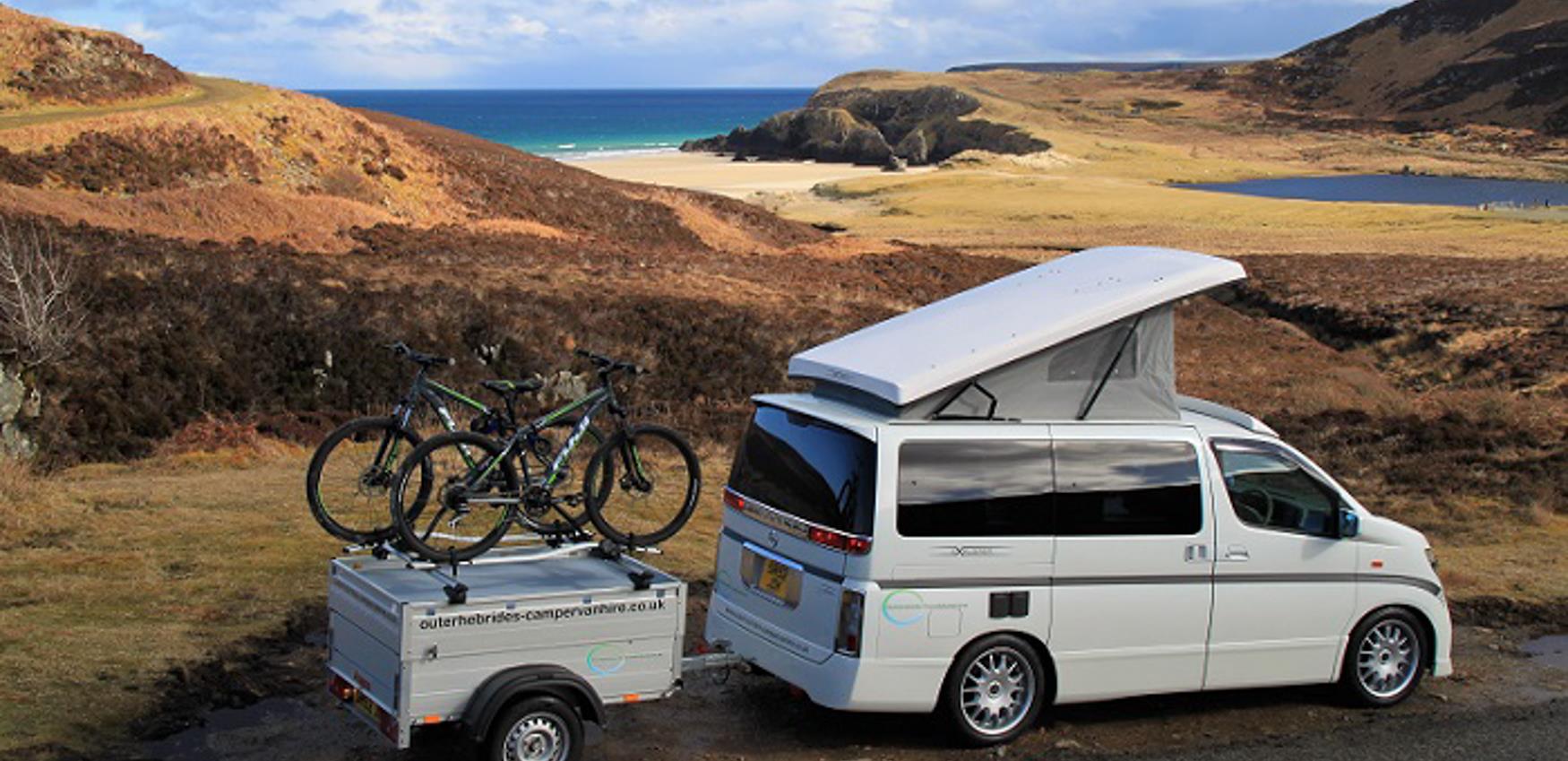 Motorhome on the road at dusk