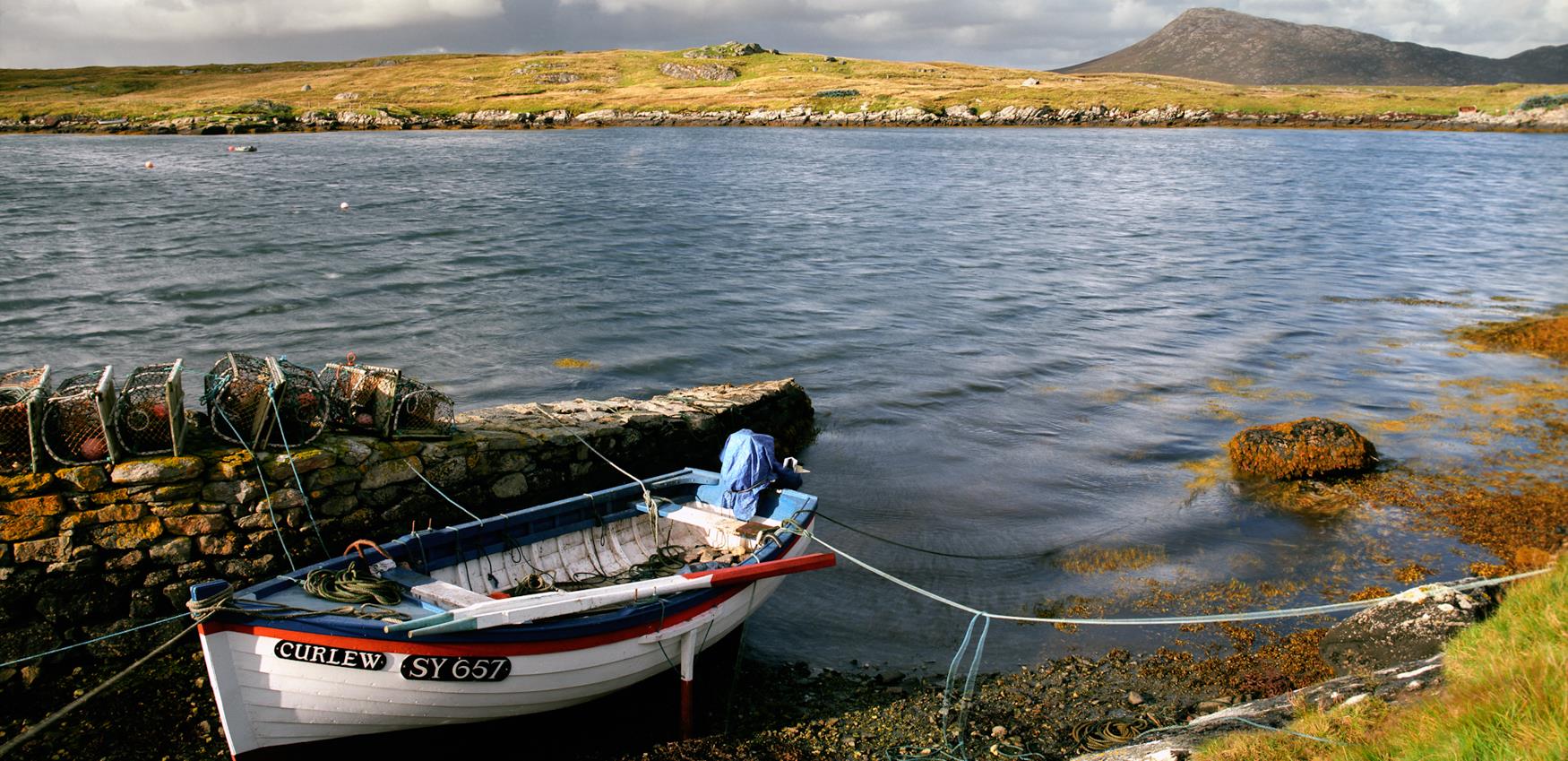 Small boat in loch at Grimsay