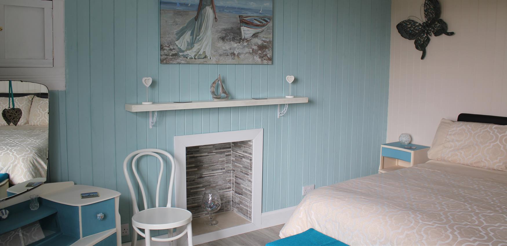 Blue bedroom in self catering cottage