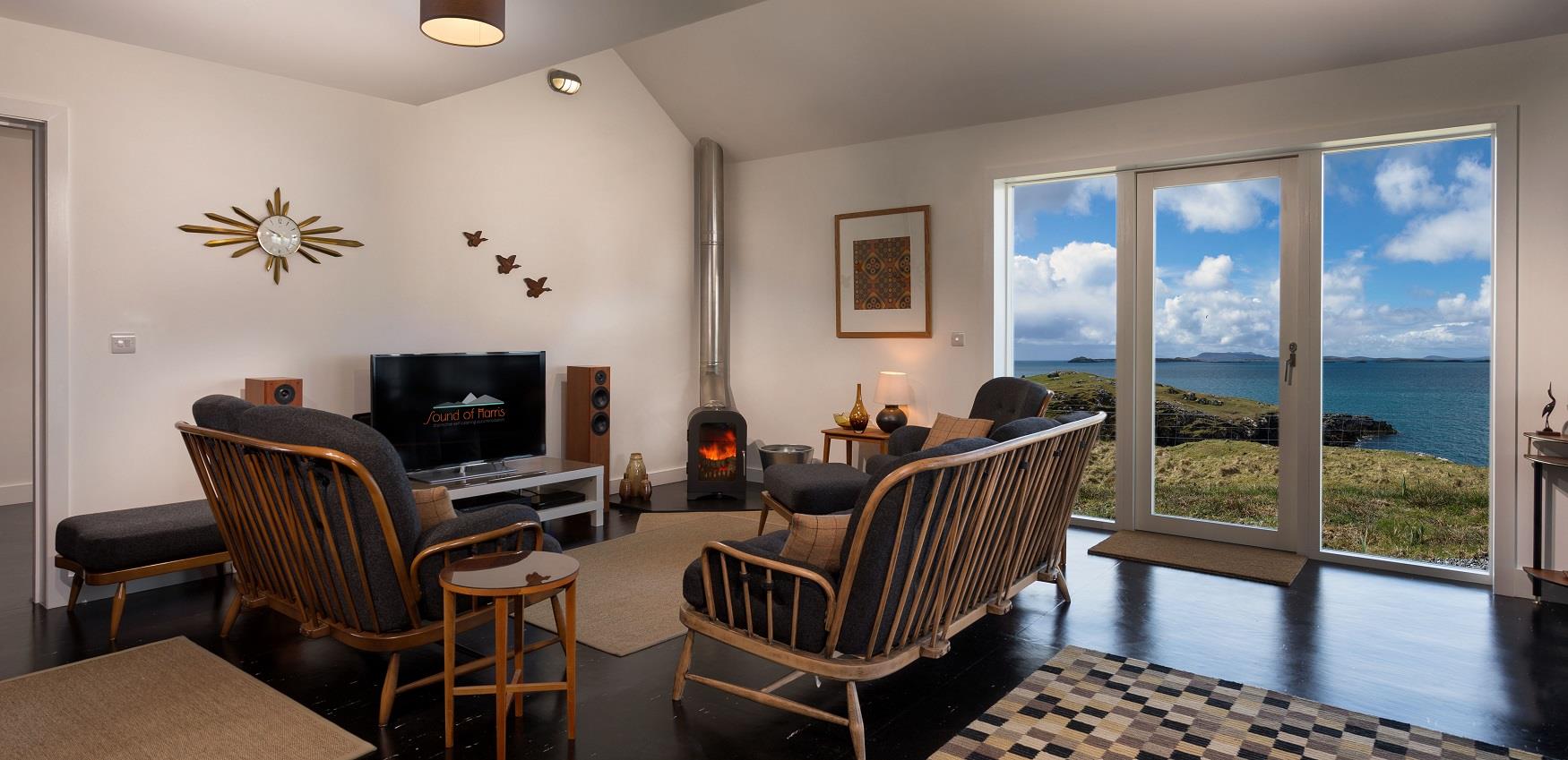 Self catering house with log fire and sea view