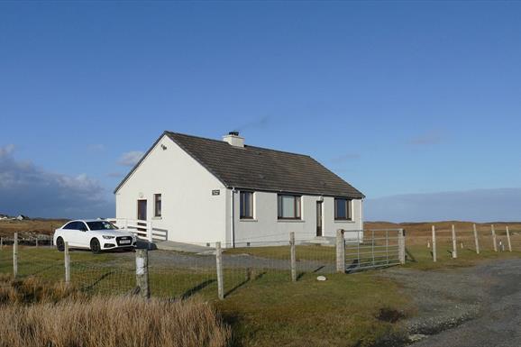 Lily Pond Cottage with car outside