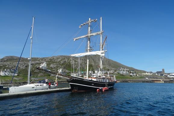 Castlebay Marina black yacht