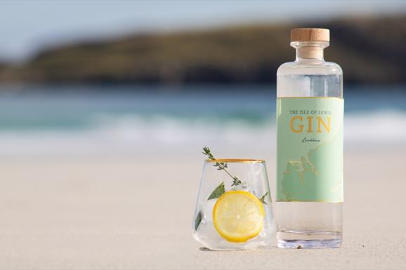 Eat Drink Hebrides - Isle of Lewis Gin Limited gin bottle & glass with lemon slice