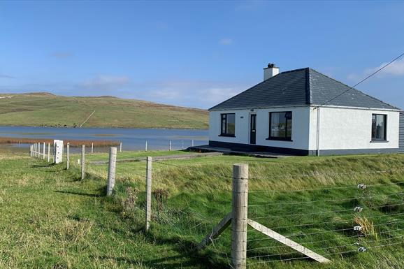 View from the front of the cottage looking down across Loch Hosta