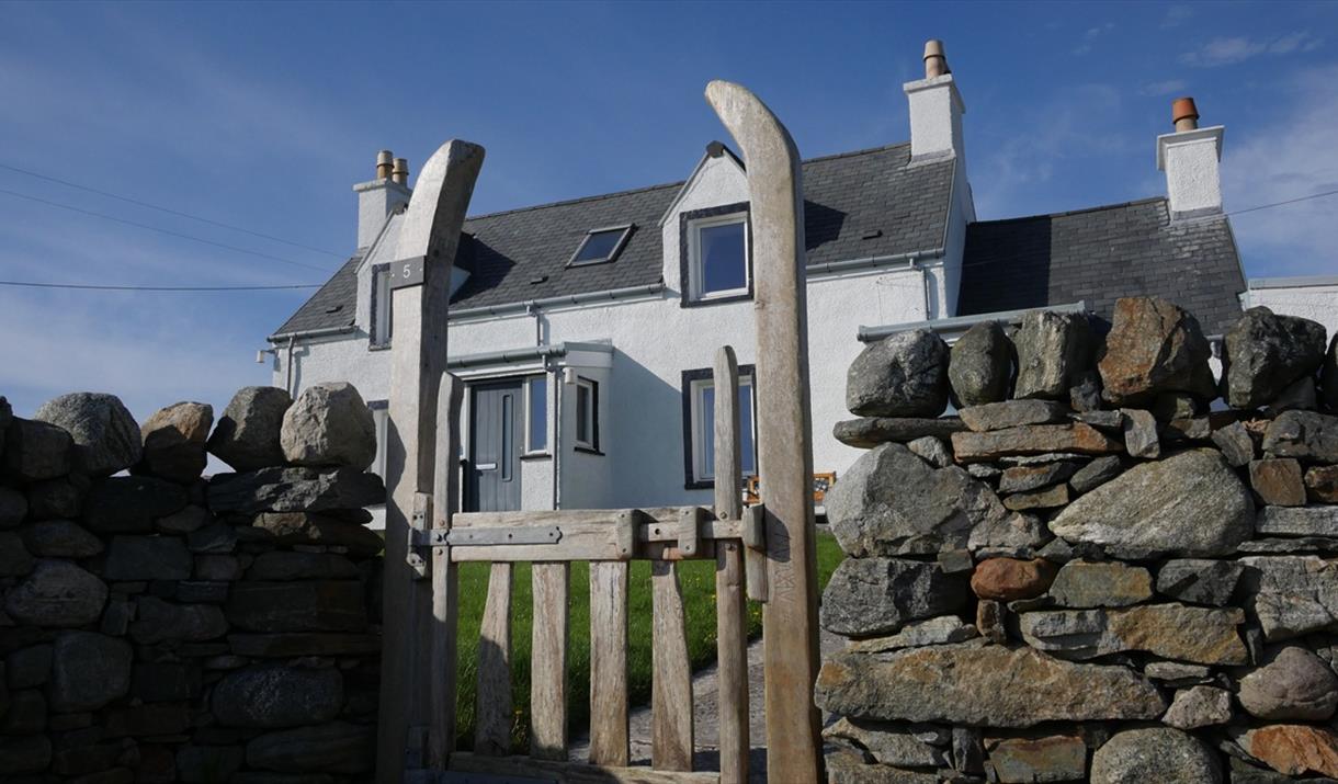 Macleod Cottage House and gate