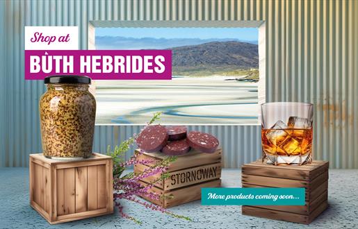 Buth Hebrides image of products in shop with a window of a view of the beach