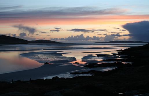 Looking out to Taransay at sunset