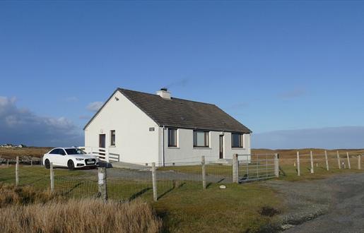 Lily Pond Cottage with car outside