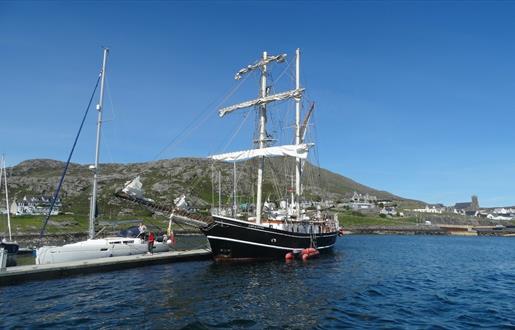 Castlebay Marina black yacht