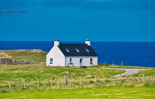 Kettle Cottage blue sky & sea