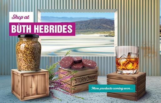 Buth Hebrides image of products in shop with a window of a view of the beach