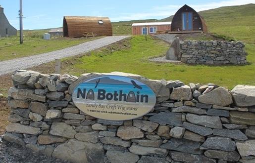 Na Bothain, Sandy Bay Wigwams ® entrance with signage