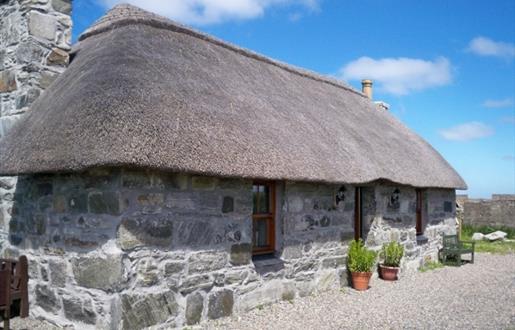 Taigh Neill stone house with thatch