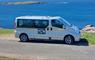 Hebridean Isle Tours van beside the sea