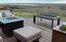 Hebridean Spa entertainment area on decking