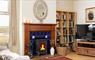 Stella Maris stove with fire & tv