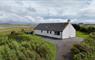 Am Bliochan self catering cottage north uist - aerial image with loch view