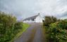 Am Bliochan self catering cottage north uist - exterior view from driveway.