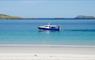 Boat at Reef Beach, Uig, Isle of Lewis. Pabbay and Old Hill in background