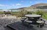 Fioran - outside table with beach view