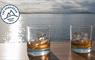 Eat Drink Hebrides - Hebridean Whisky Trail 2 whisky glasses by the sea