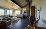 The Tidal Dwelling lounge with sea views