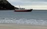 Uist Sea Tours boat by the beach