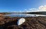 Carloway Estate Trust fishing boat by a loch