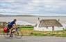 Cyclist at Sollas Cottage, Noorth Uist