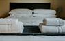 Uist Travel Accommodation towels on double bed