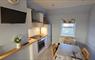 Kitchen and table seating 4 Heisgeir View Holiday Cottage