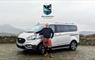 Drummond Scottish Tours Ford Tourneo vehicle with William Drummond standing in front.