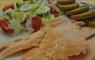 Close up photo of a plate of food, showing smoked salmon, oatcakes and salad.