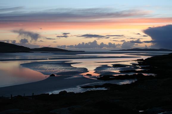 Looking out to Taransay at sunset