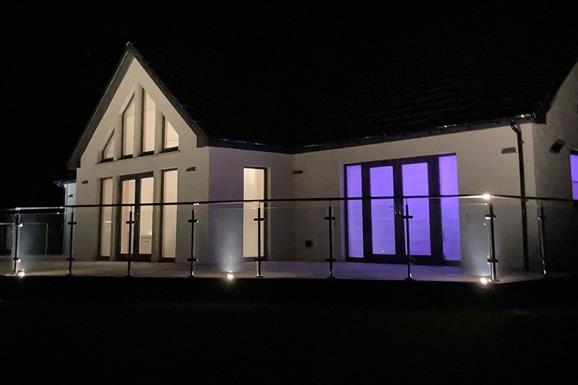Skipper's Retreat house lit up at night
