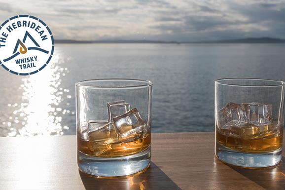 Hebridean Whisky Trail 2 whisky glasses by the sea