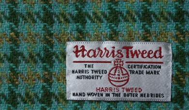 Harris Tweed Isle of Harris green tweed with logo