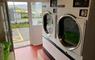 Coin-operated launderette at Kinloch Community Hub.
