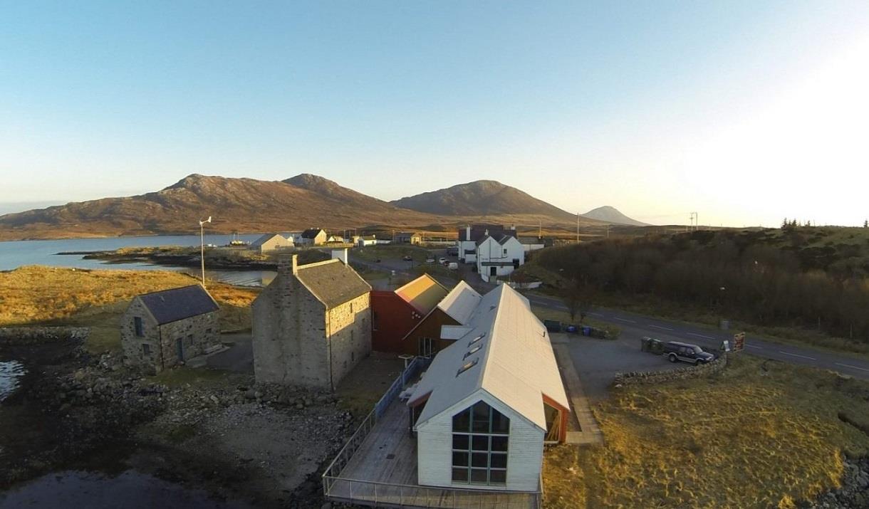 Aerial photo of the Taigh Chearsabhagh building, looking towards Lochmaddy Pier and Lee.