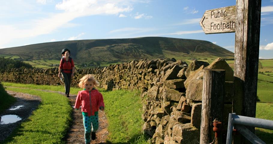 Picture of a family walking near Pendle Hill