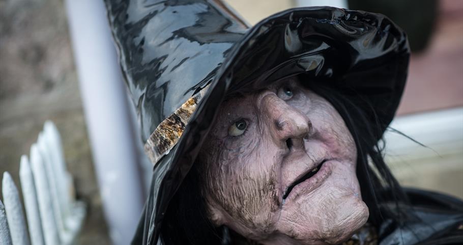 Picture of Pendle Witch outside Witches Galore shop