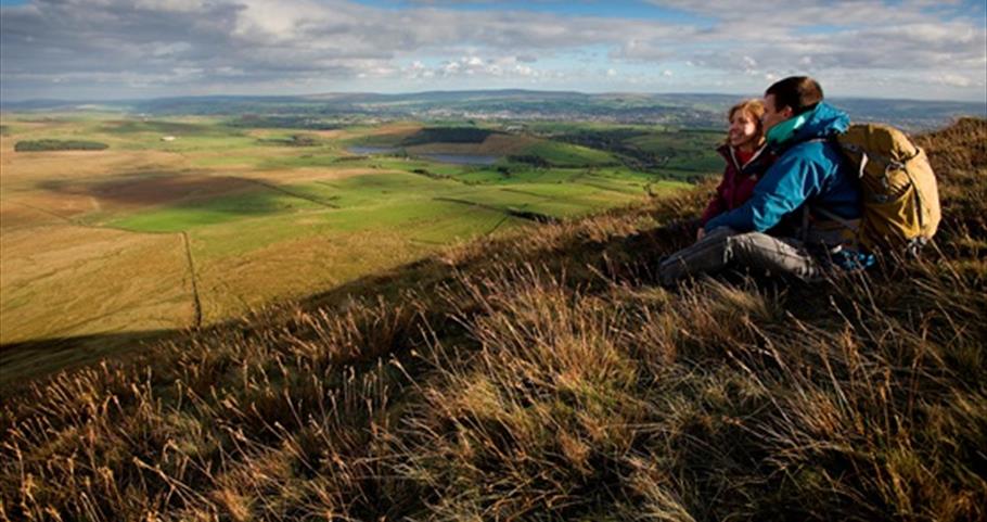 Picture of walkers on top of Pendle Hill