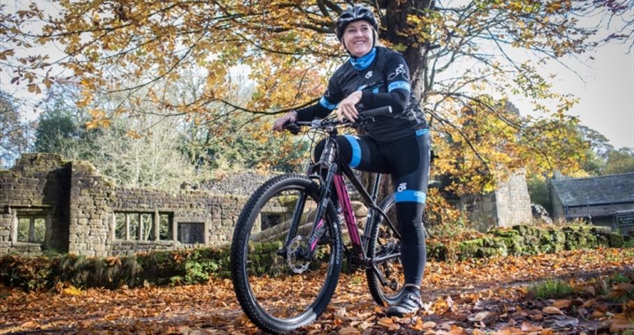Picture of Kirsti on a mountain bike at Wycoller