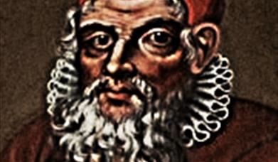 A lithograph of an old bearded man wearing an Elizabethan ruff.