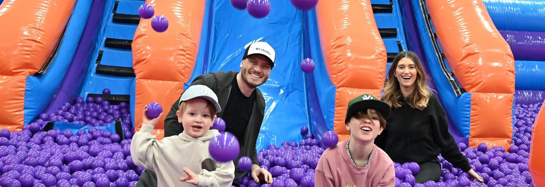 Family enjoying themselves at Inflata Nation, Peterborough