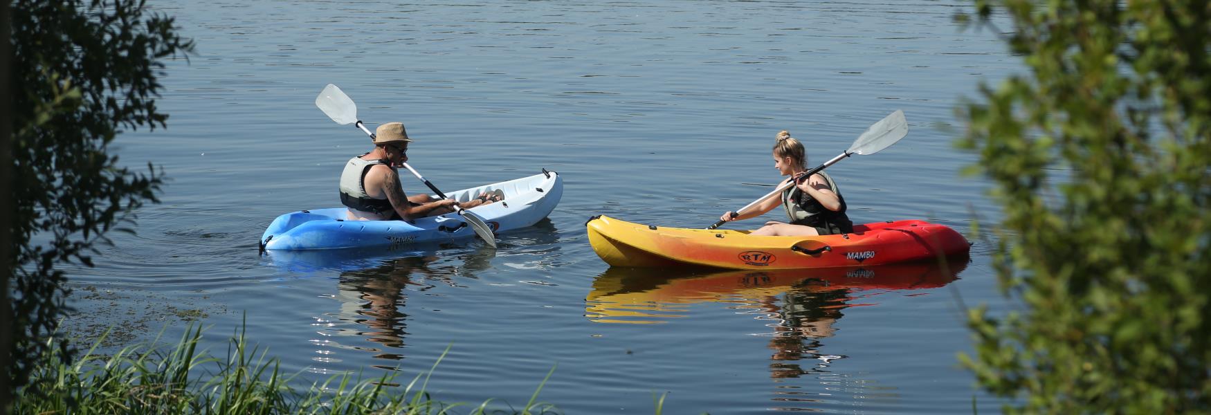 Two people kayaking at Ferry Meadows in Nene Park