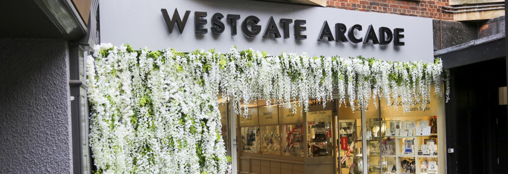 Entrance to Westgate Arcade - the home of independent retail in Queensgate Shopping Centre.